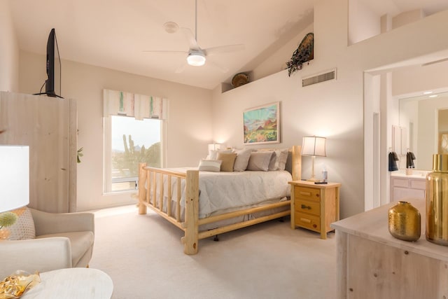 bedroom featuring light carpet, ceiling fan, visible vents, and vaulted ceiling