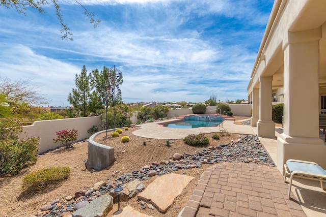 view of pool featuring a fenced in pool, a patio area, and a fenced backyard