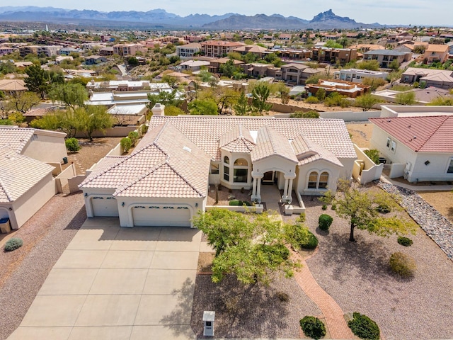 bird's eye view featuring a residential view and a mountain view