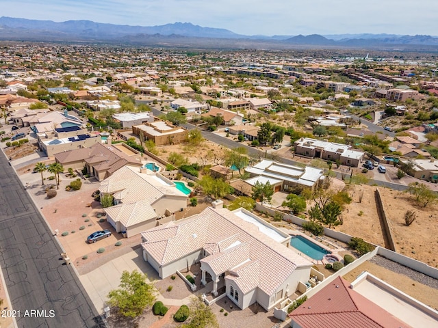 drone / aerial view featuring a mountain view