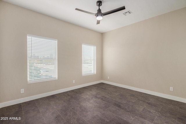 spare room featuring ceiling fan