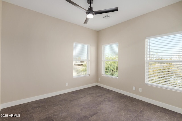 unfurnished room featuring ceiling fan