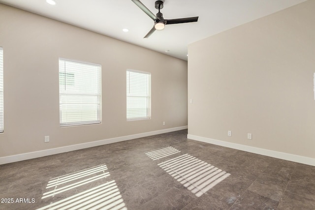 spare room with ceiling fan