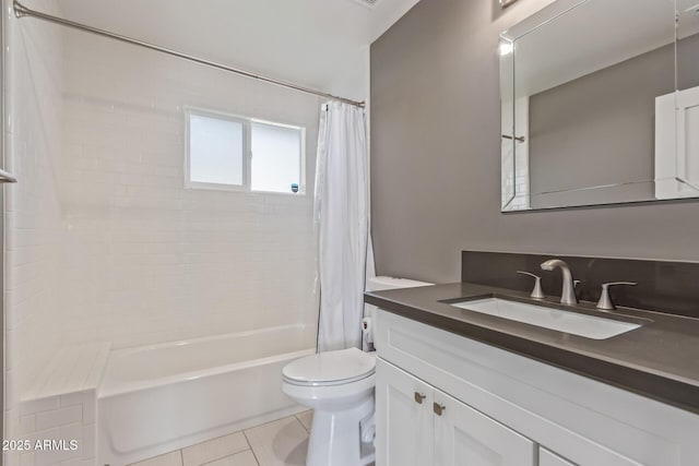 bathroom with shower / bath combination with curtain, vanity, tile patterned flooring, and toilet