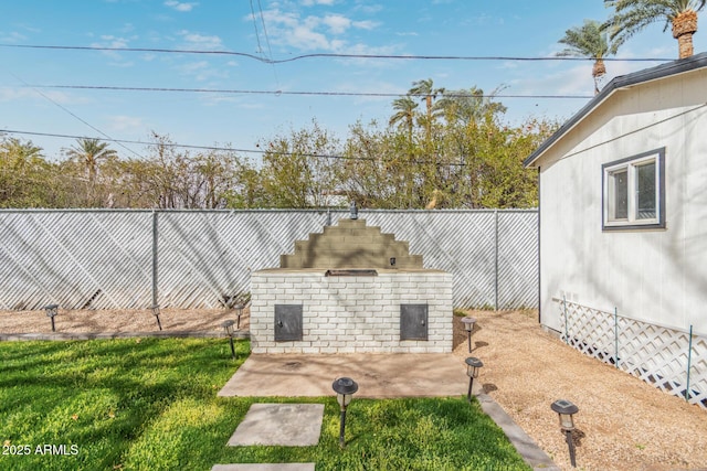 view of yard with a patio and a fenced backyard