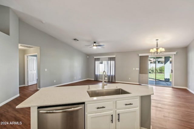 kitchen with white cabinets, a center island with sink, sink, vaulted ceiling, and stainless steel dishwasher