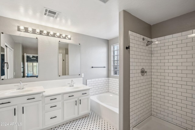 bathroom with plus walk in shower and vanity