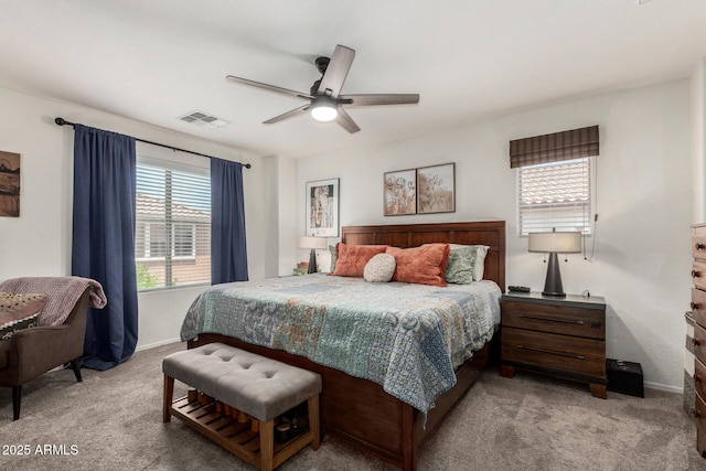 2048 S Martingale Rd, Gilbert, AZ 85295 - bedroom featuring light carpet, baseboards, and a ceiling fan