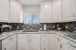 kitchen with white cabinetry