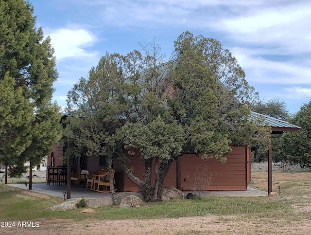 exterior space with a patio area