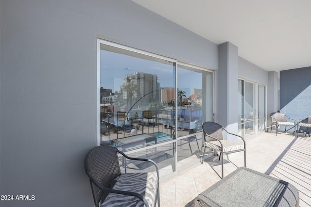view of patio with a balcony