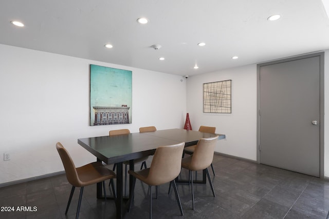dining space with recessed lighting and baseboards