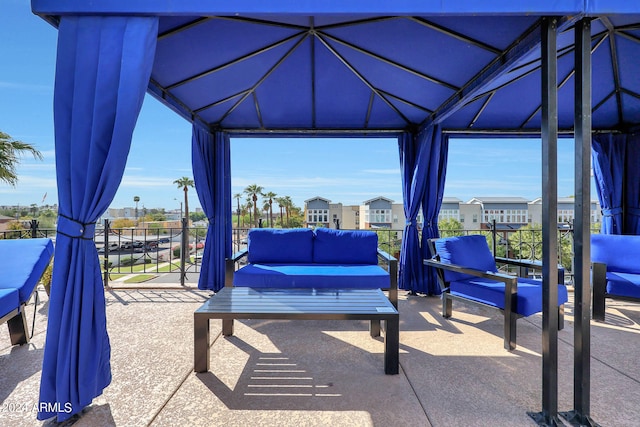 view of patio with outdoor lounge area and a gazebo