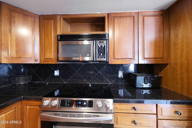kitchen with tasteful backsplash, tile countertops, brown cabinets, and stainless steel appliances
