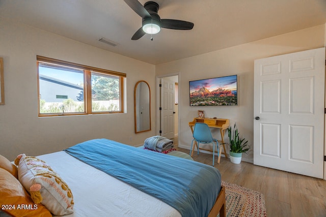 bedroom featuring ceiling fan and light wood-type flooring