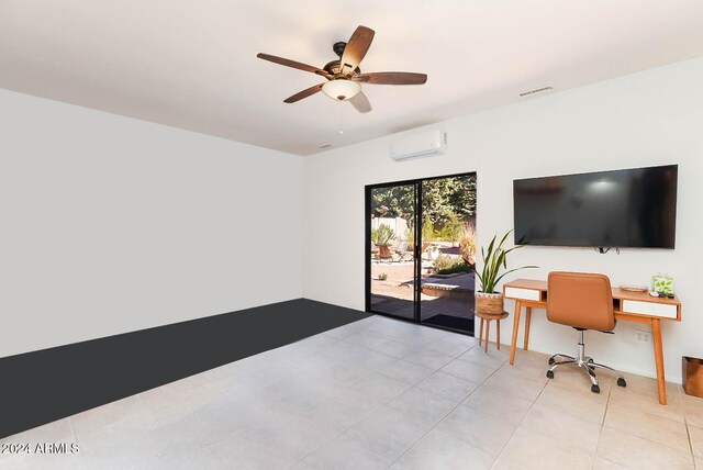 tiled office space with a wall unit AC and ceiling fan