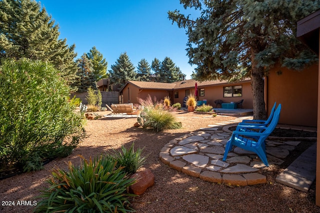 view of yard with a patio area and an outdoor living space