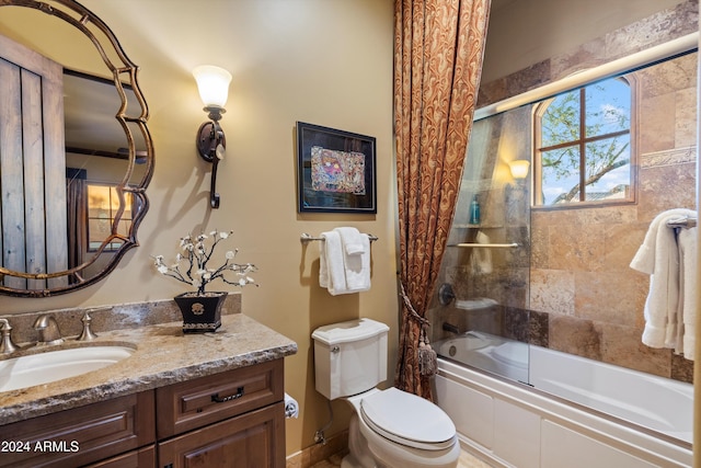 full bathroom with vanity, toilet, and shower / bath combo