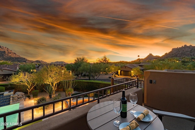 balcony at dusk with a mountain view