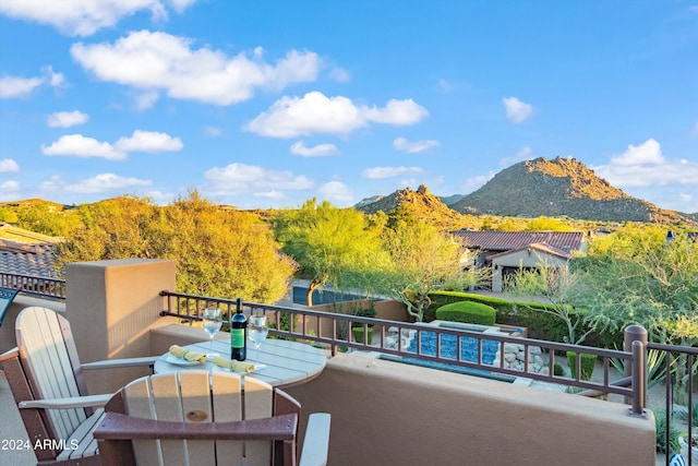 balcony featuring a mountain view