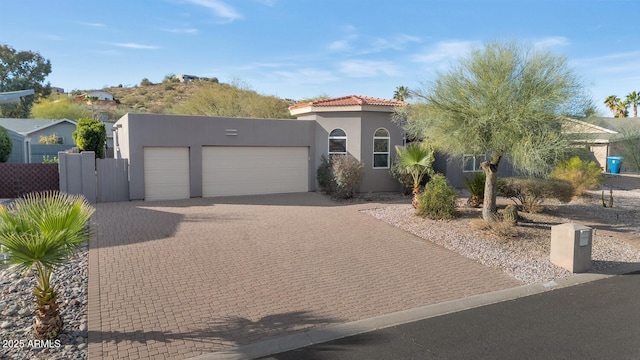 view of front of property with a garage