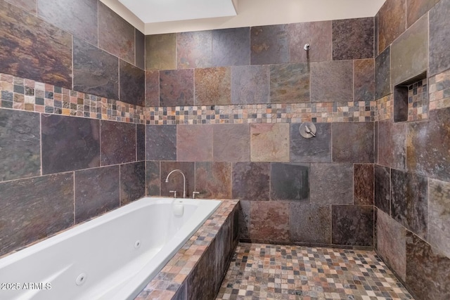 bathroom with tiled tub