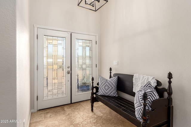 entryway featuring french doors