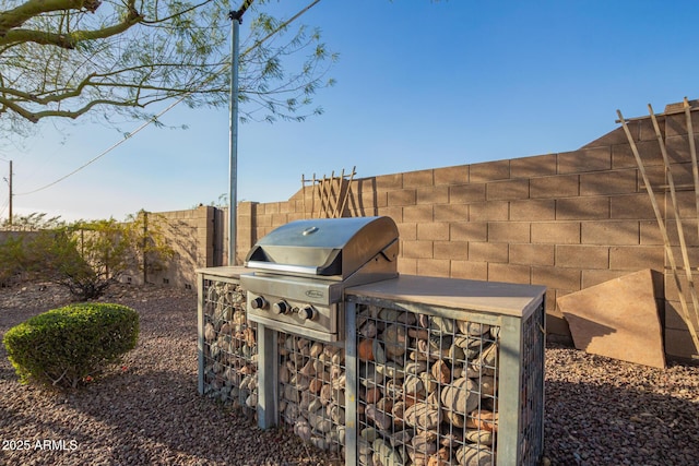 exterior details featuring a fenced backyard