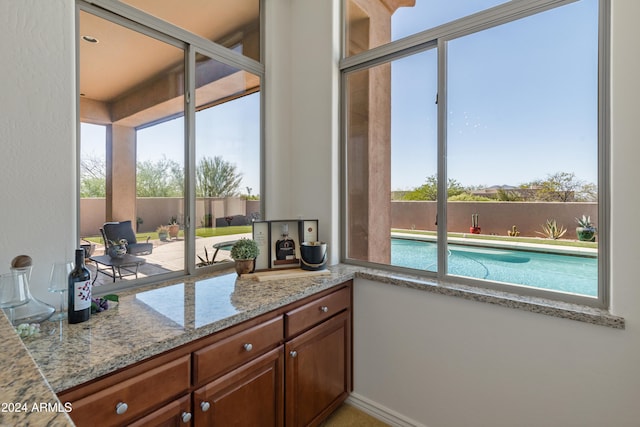 interior space featuring light stone counters