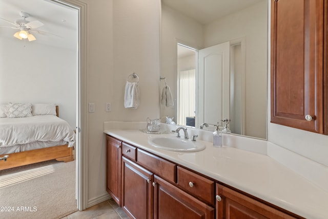 bathroom with vanity, tile patterned flooring, and ceiling fan