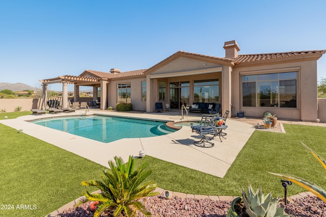 view of swimming pool with a pergola, a patio area, and a yard