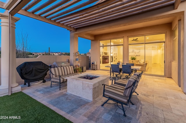 view of patio / terrace with an outdoor fire pit, area for grilling, and a pergola