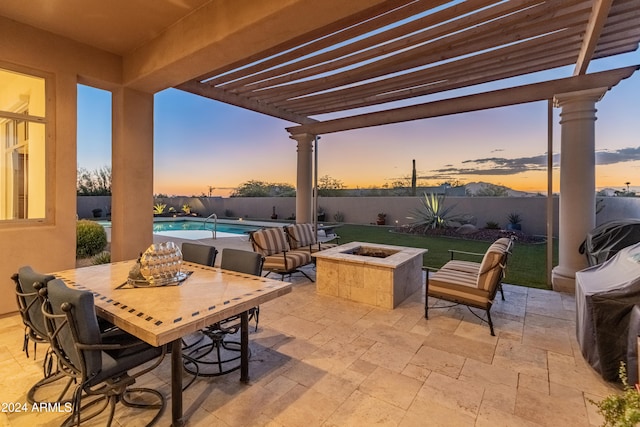 patio terrace at dusk with a fenced in pool, a fire pit, and a pergola