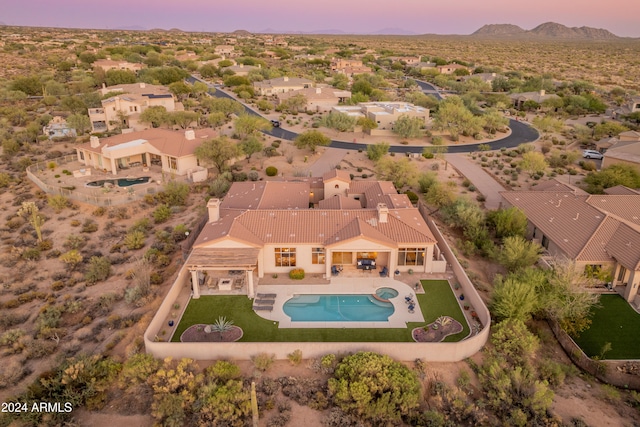 view of aerial view at dusk