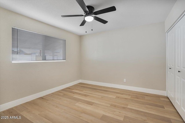 3846 W Cavalier Dr, Phoenix, AZ 85019 - unfurnished bedroom with light wood-type flooring, a closet, and baseboards