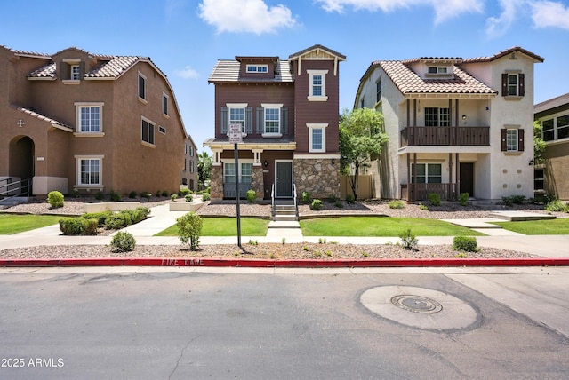 2109 E Fraktur Rd, Phoenix, AZ 85040 - view of front of property featuring stone siding, stucco siding, and a tiled roof