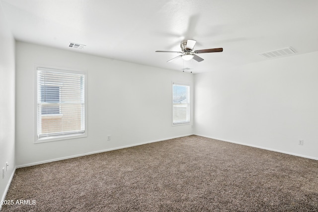 2109 E Fraktur Rd, Phoenix, AZ 85040 - carpeted empty room featuring ceiling fan and baseboards