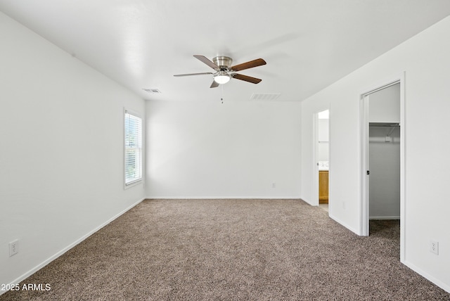 2109 E Fraktur Rd, Phoenix, AZ 85040 - unfurnished room featuring a ceiling fan and carpet floors