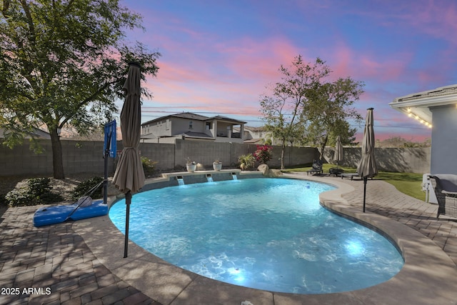 view of pool with a fenced backyard, a fenced in pool, and a patio