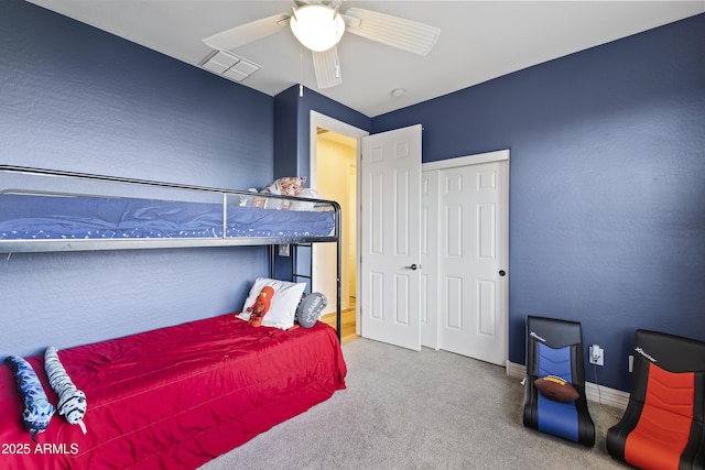 bedroom featuring carpet floors, visible vents, ceiling fan, and baseboards