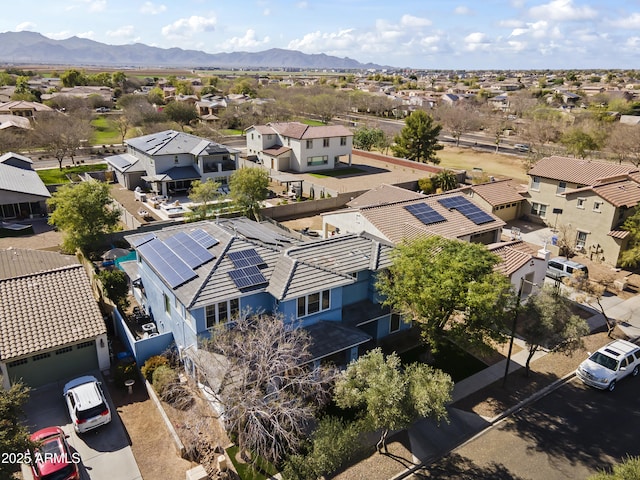 bird's eye view with a residential view and a mountain view