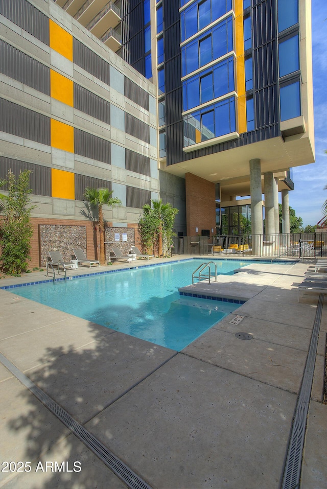 view of pool featuring a patio area