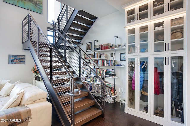 staircase featuring hardwood / wood-style floors