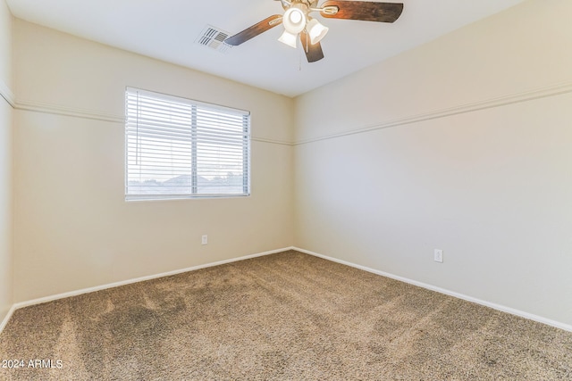 carpeted empty room with ceiling fan