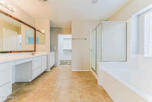 bathroom with vanity, tile patterned floors, and separate shower and tub