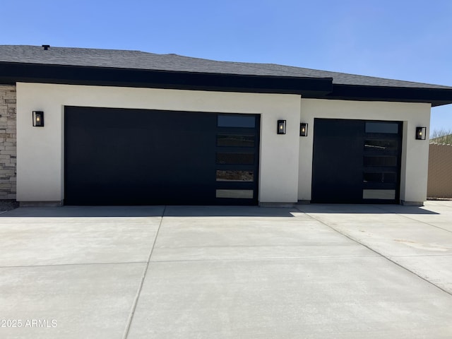 4079 E Roosevelt St, Apache Junction, AZ 85119 - view of front of property featuring concrete driveway, stucco siding, and an attached garage