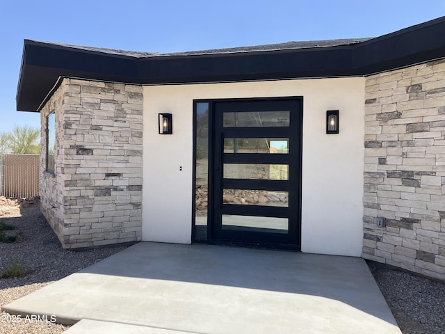 4079 E Roosevelt St, Apache Junction, AZ 85119 - doorway to property featuring stone siding and stucco siding
