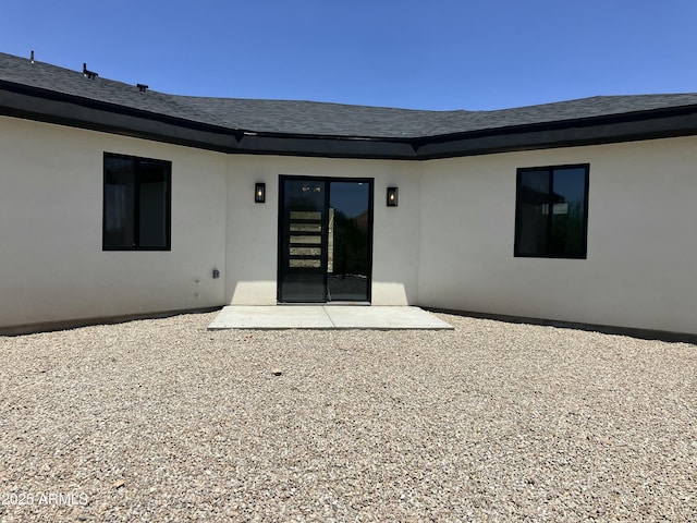 4079 E Roosevelt St, Apache Junction, AZ 85119 - back of property featuring a patio area and stucco siding