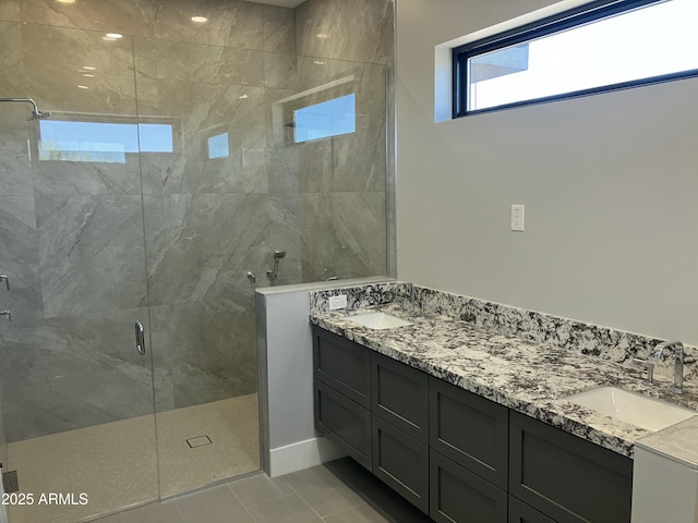 4079 E Roosevelt St, Apache Junction, AZ 85119 - full bath with double vanity, a stall shower, and tile patterned flooring