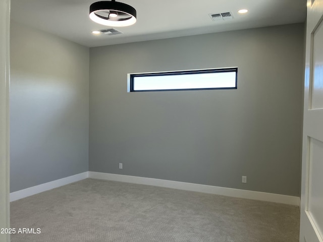 4079 E Roosevelt St, Apache Junction, AZ 85119 - unfurnished room with healthy amount of natural light, light colored carpet, and recessed lighting